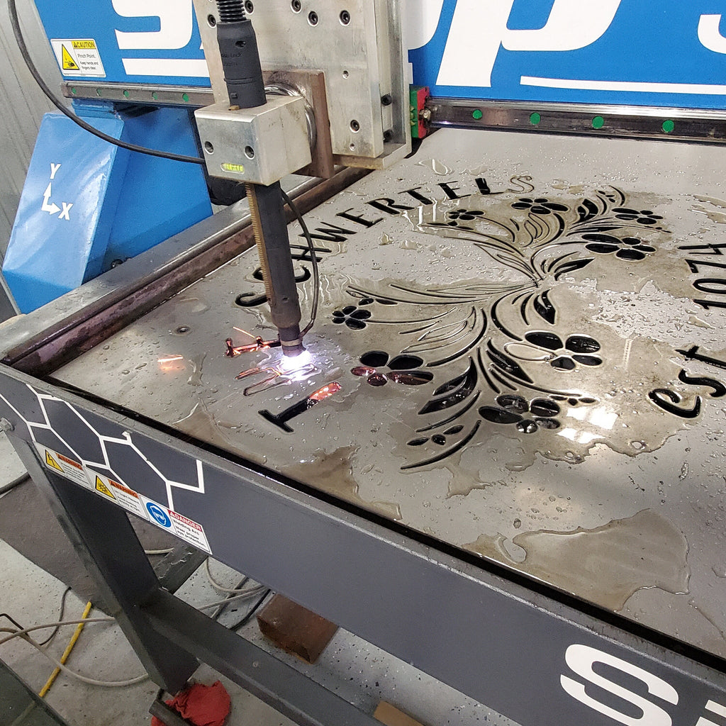 CNC plasma cutting the Fillable Floral Family Name Sign design (photo 7)