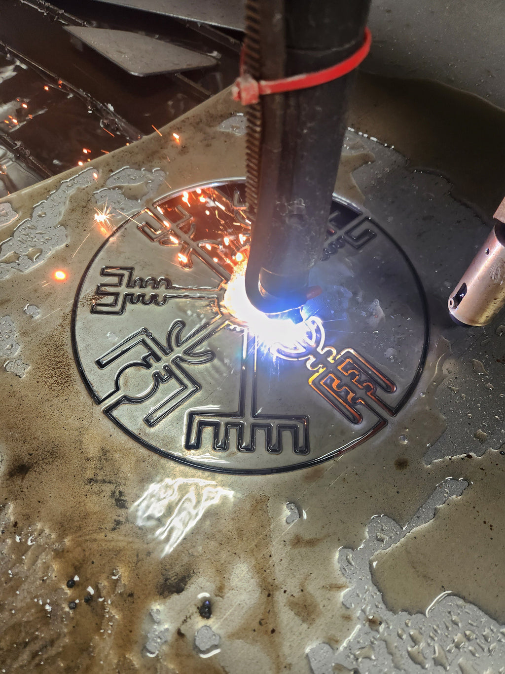 CNC plasma cutting the Vegvisir Compass Rune Sign design (photo 7)