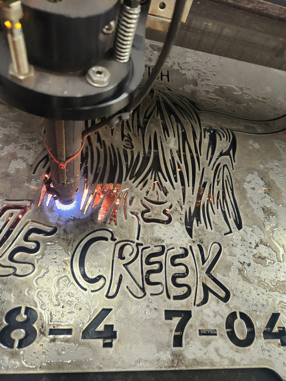 CNC plasma cutting the Highland Cow Rectangle Panel design