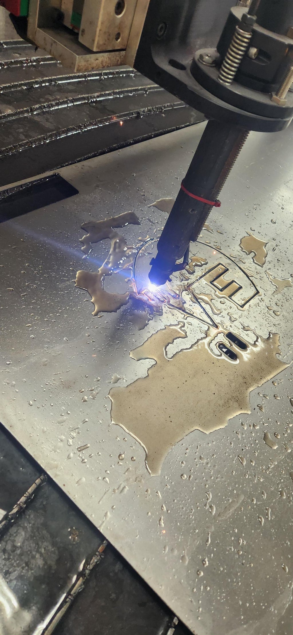 CNC plasma cutting the Rescue Love Dog Sign design (photo 4)