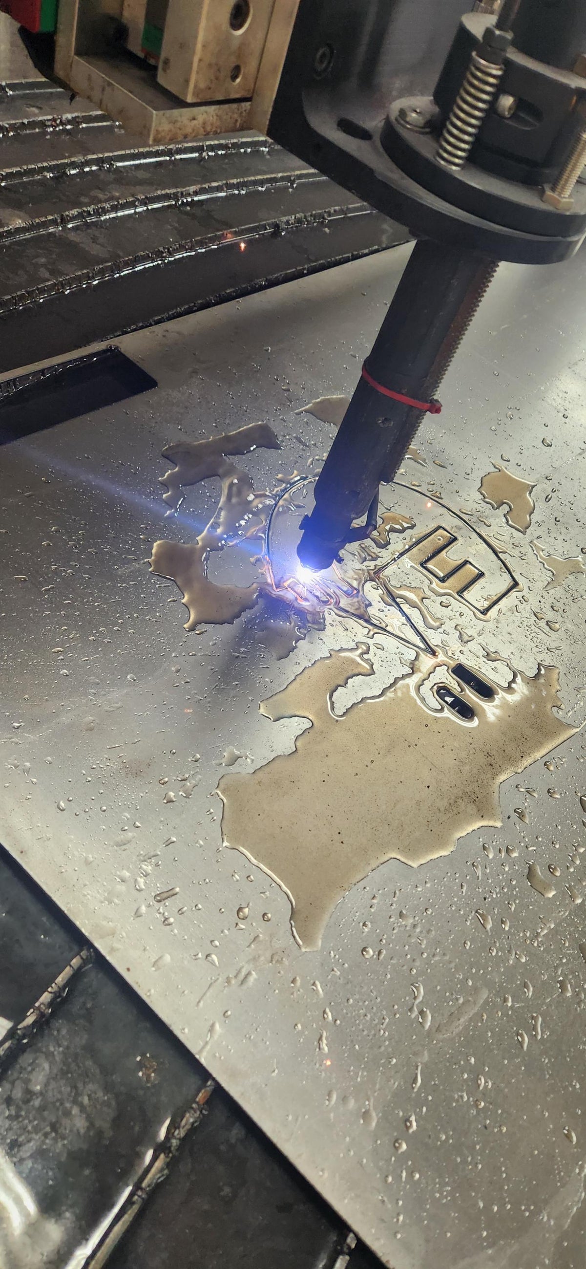 CNC plasma cutting the Rescue Love Dog Sign design (photo 4)