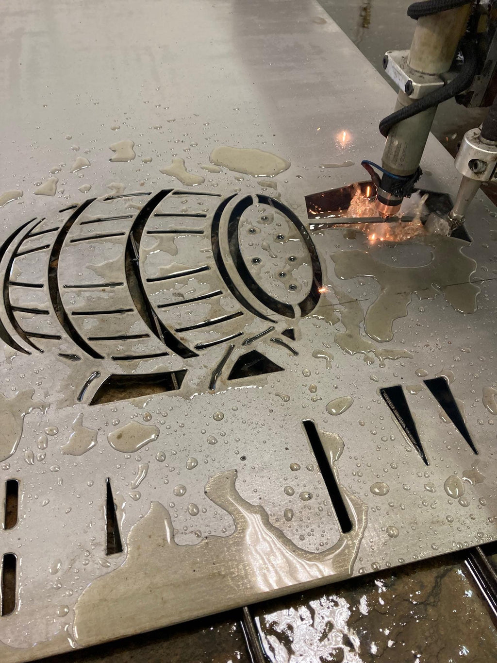 CNC plasma cutting the Bourbon Barrel Pour Name Sign design (photo 5)