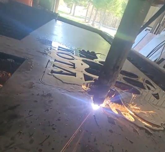 CNC plasma cutting the Dog Paw Halo Memorial Stake design