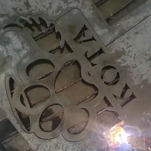 CNC plasma cutting the Dog Paw Halo Memorial Sign Pack design (photo 8)