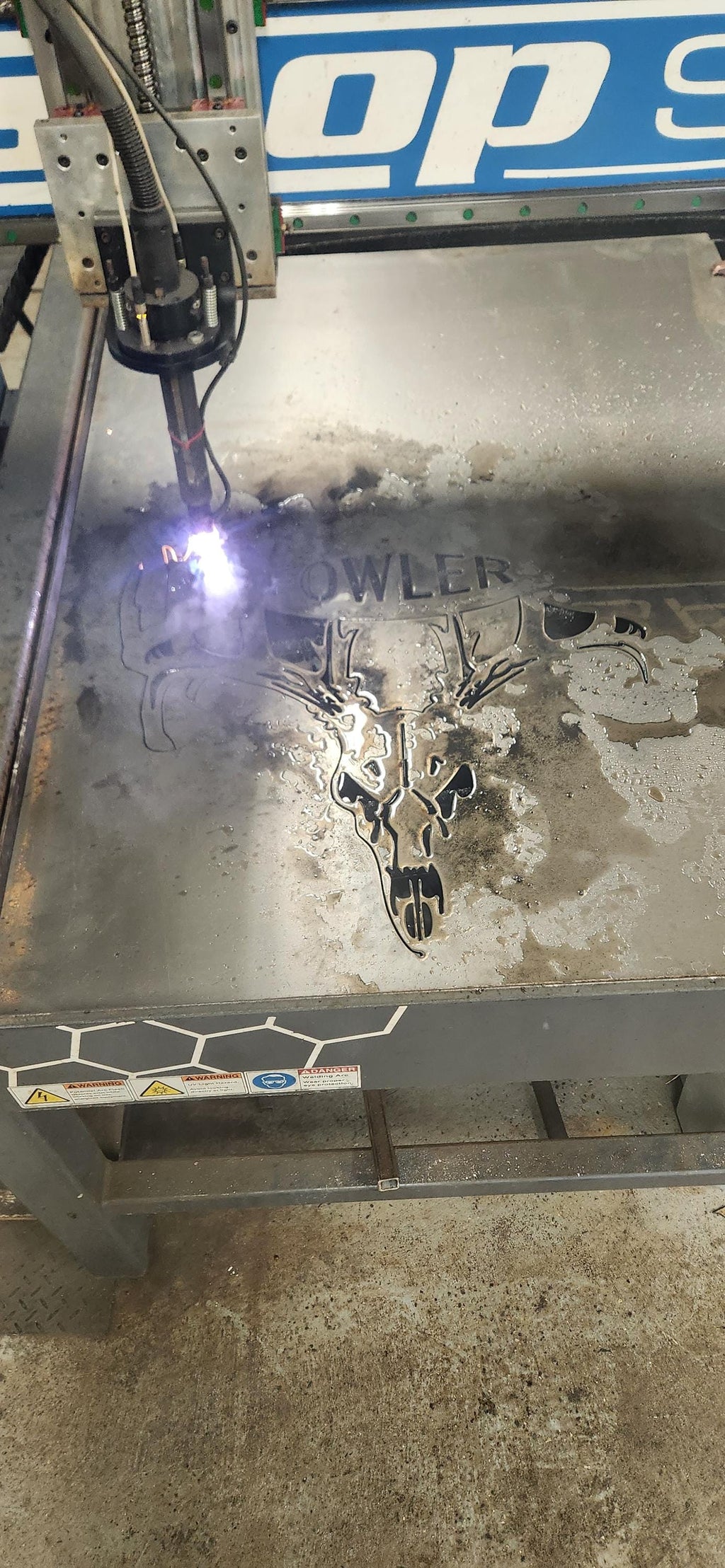 CNC plasma cutting the Deer Skull Gun Bow Hanger design (photo 7)