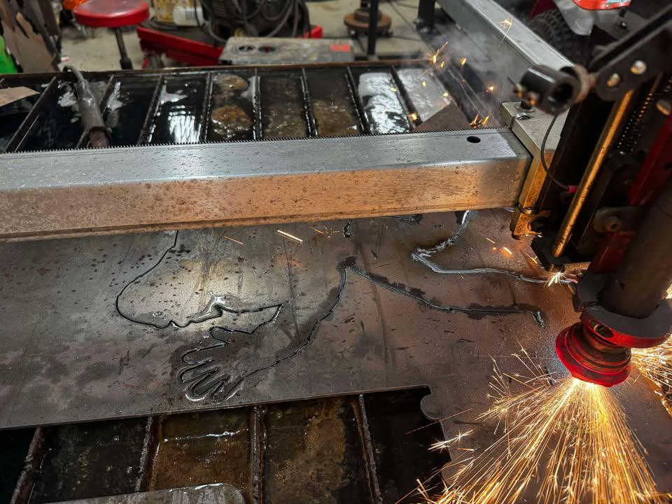 CNC plasma cutting the Giant 8 ft Waving Sasquatch Silhouette design