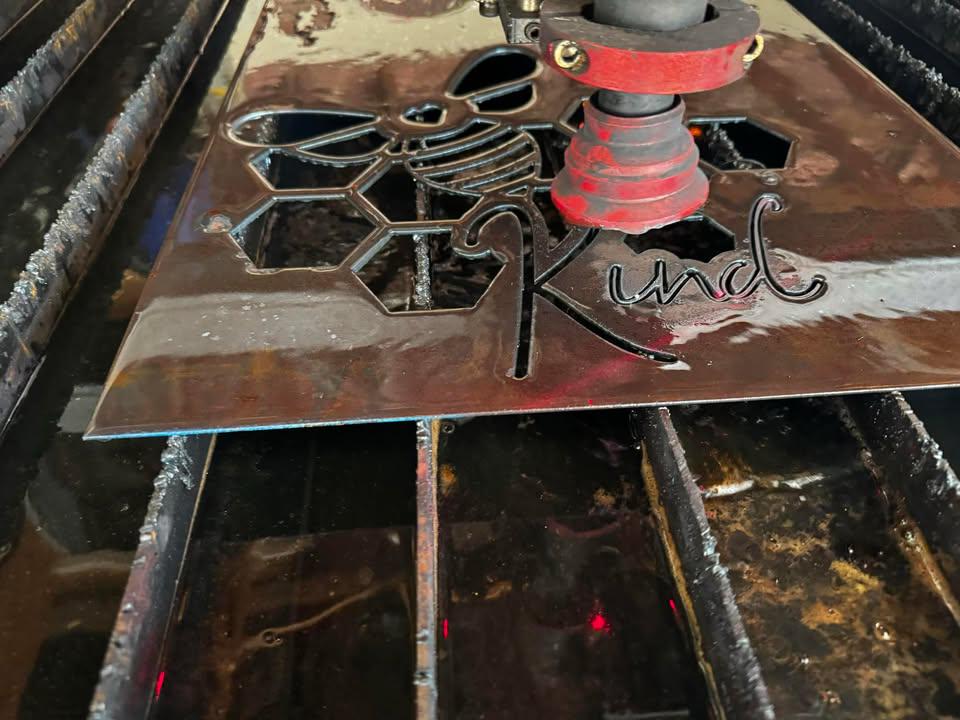 CNC plasma cutting the Bee Kind Honeycomb Sign design