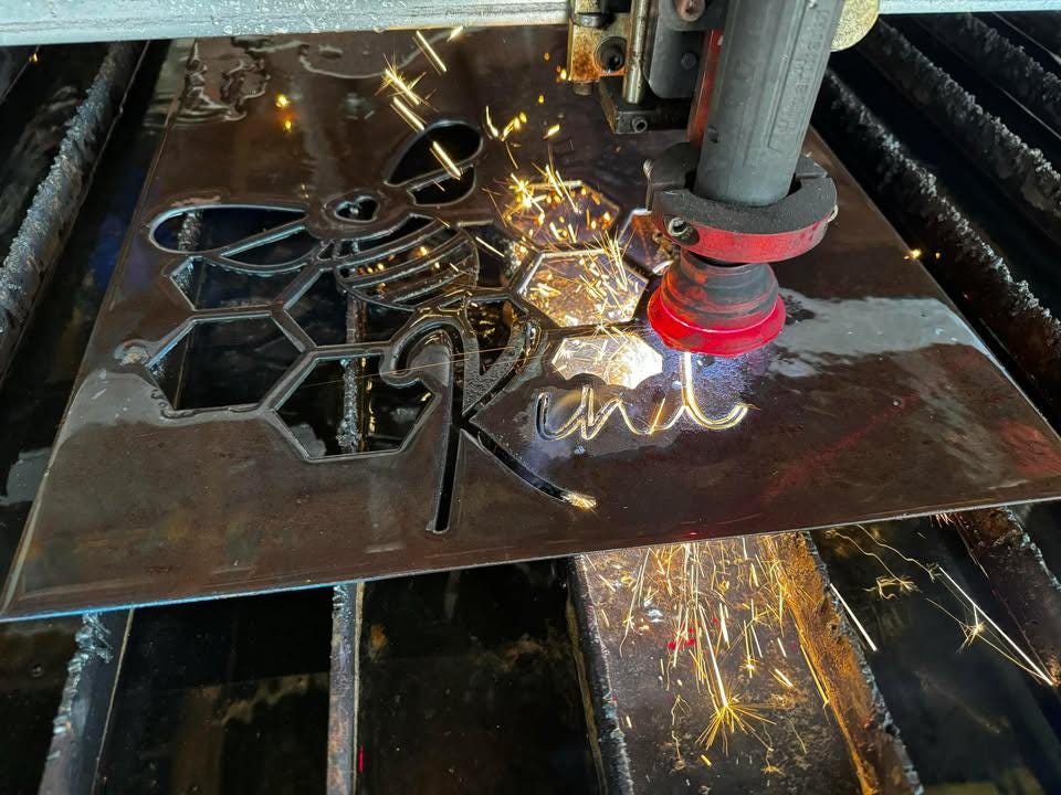 CNC plasma cutting the Bee Kind Honeycomb Sign design (photo 9)