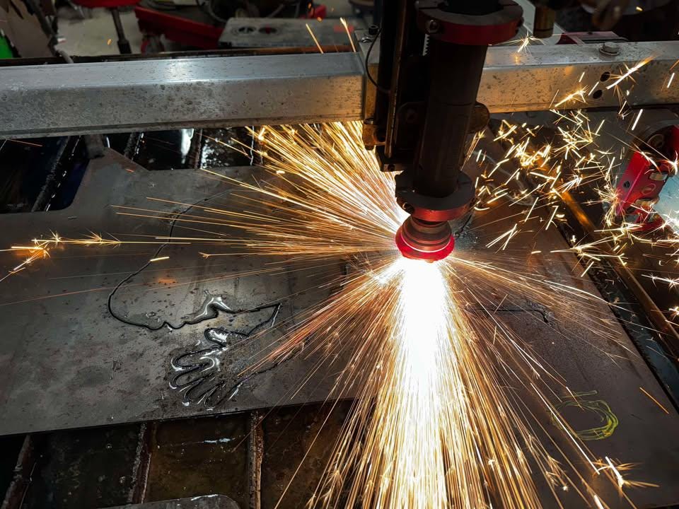 CNC plasma cutting the Giant 8 ft Waving Sasquatch Silhouette design (photo 10)